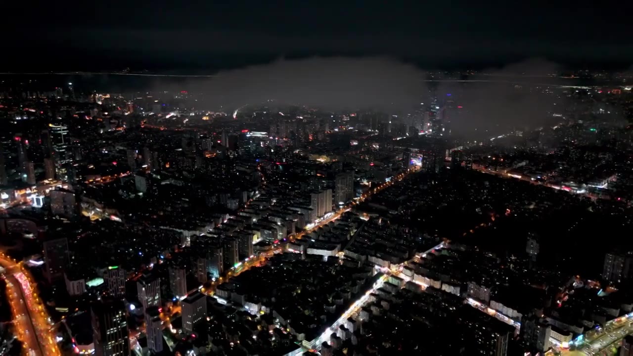 中国山东青岛城市夜景灯光秀航拍繁华城市高楼鸟瞰视频素材