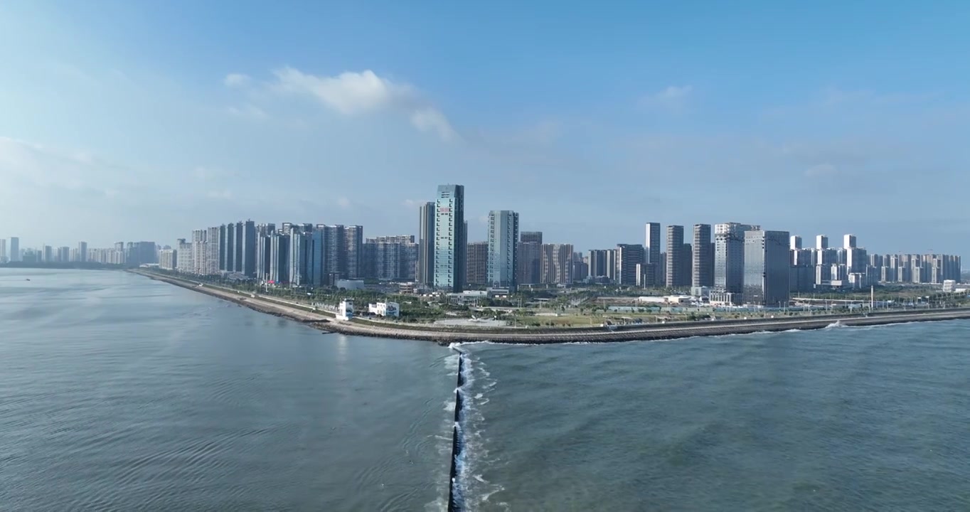 航拍广东汕头东海岸大道旁的摩天大楼