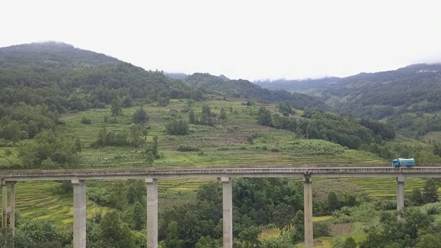 乡间公路行驶卡车航拍视频素材