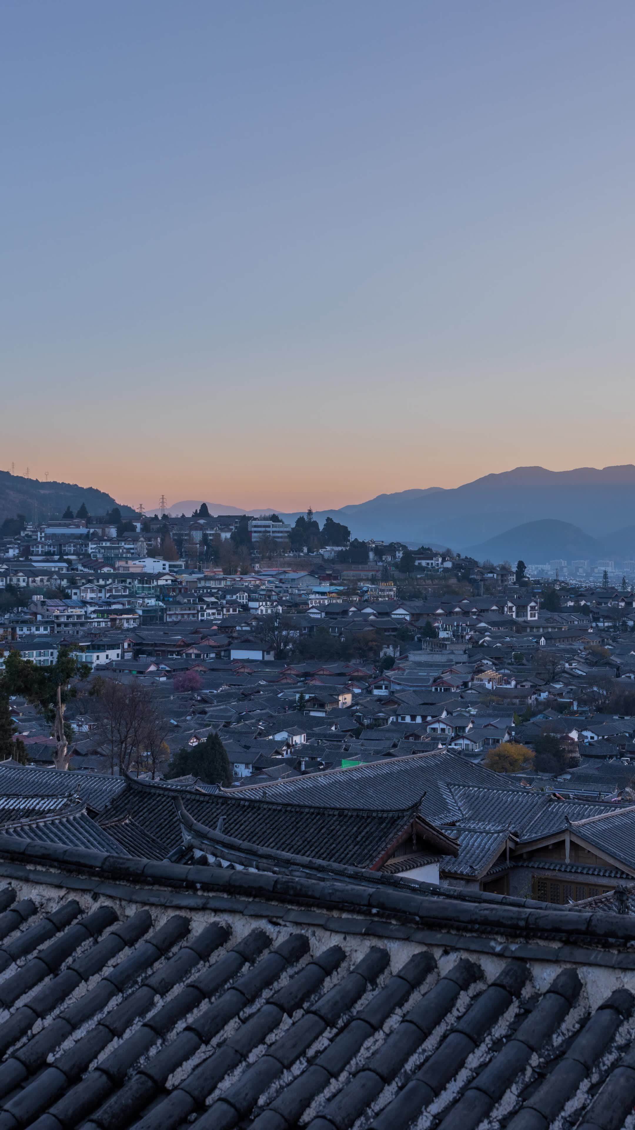 丽江古城日转夜和玉龙雪山日照金山延时合集视频素材画面1