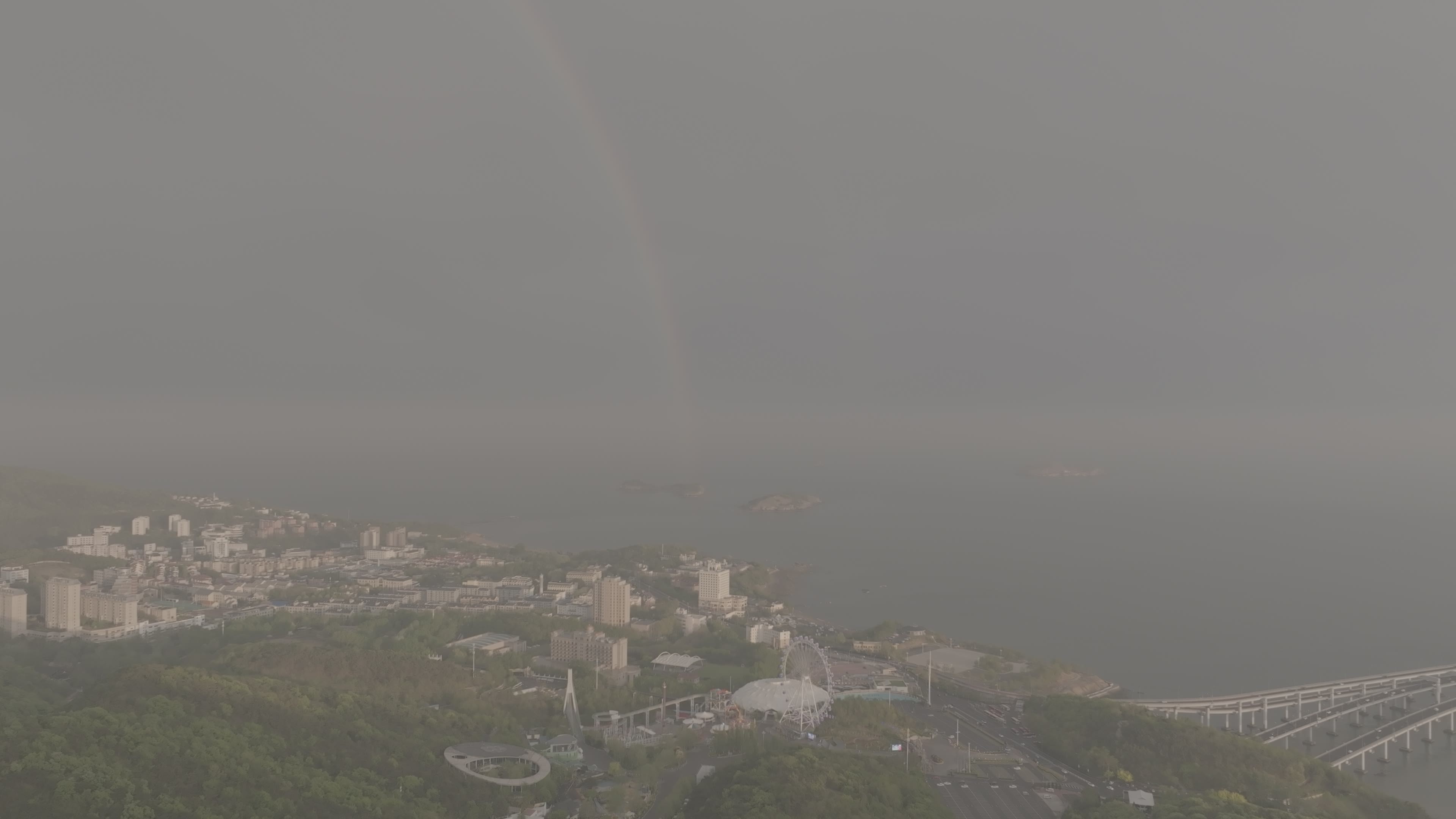 大连海岛上空雨后彩虹航拍DLOG模式视频素材画面1