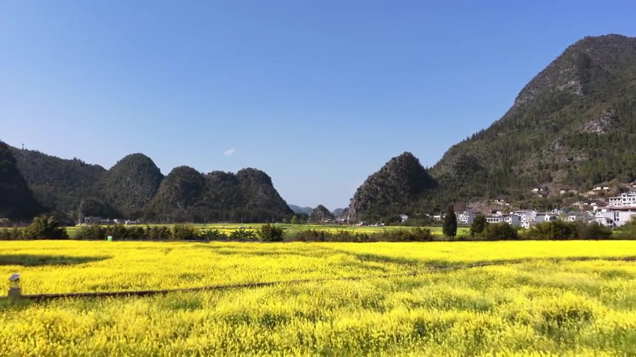 贵州万峰林八卦田航拍视频素材画面4