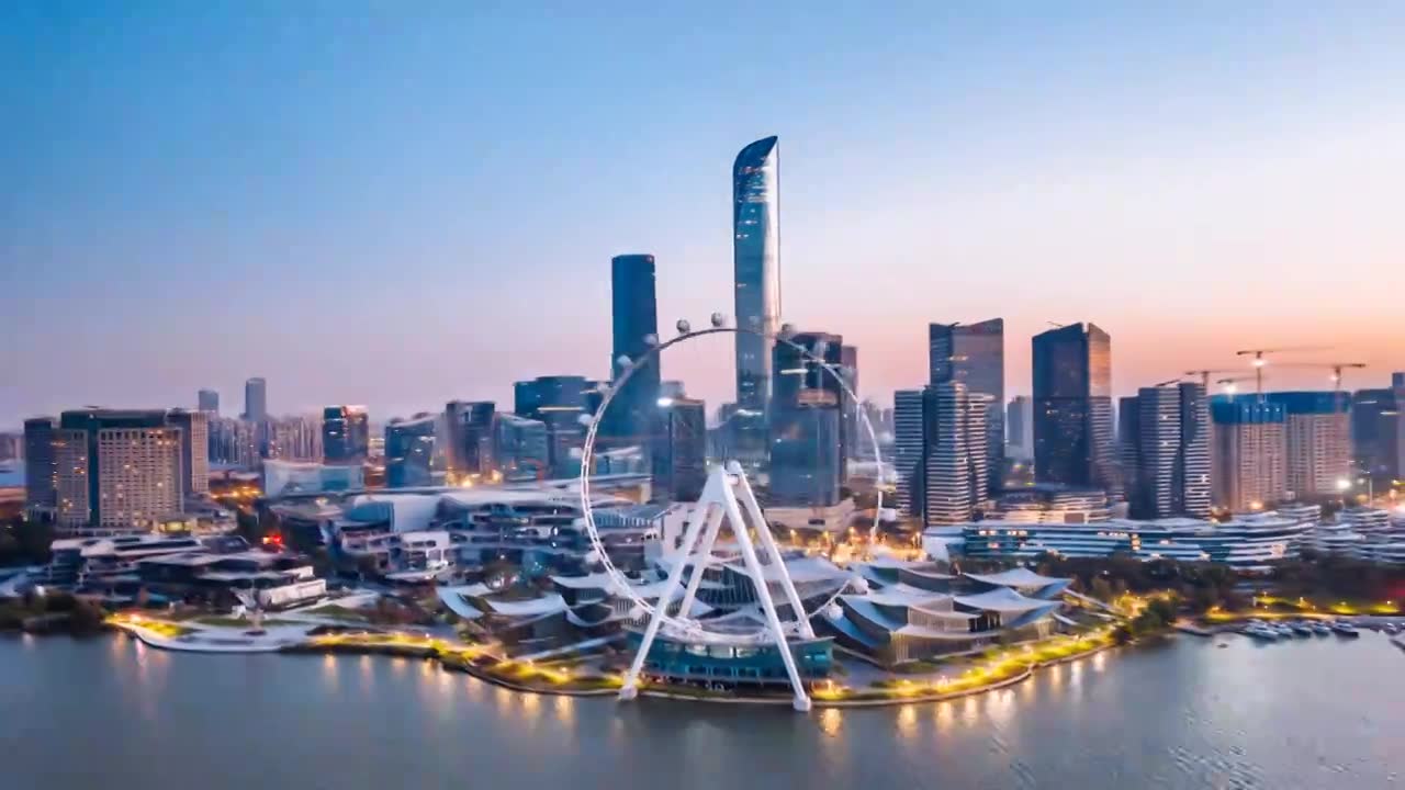 中国江苏苏州金鸡湖摩天轮城市天际线夜景航拍环绕延时摄影视频素材画面1