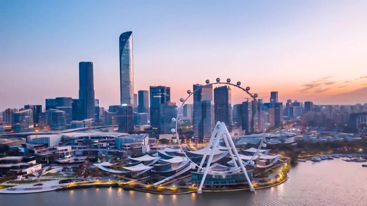 中国江苏苏州金鸡湖摩天轮城市天际线夜景航拍环绕延时摄影视频素材画面3