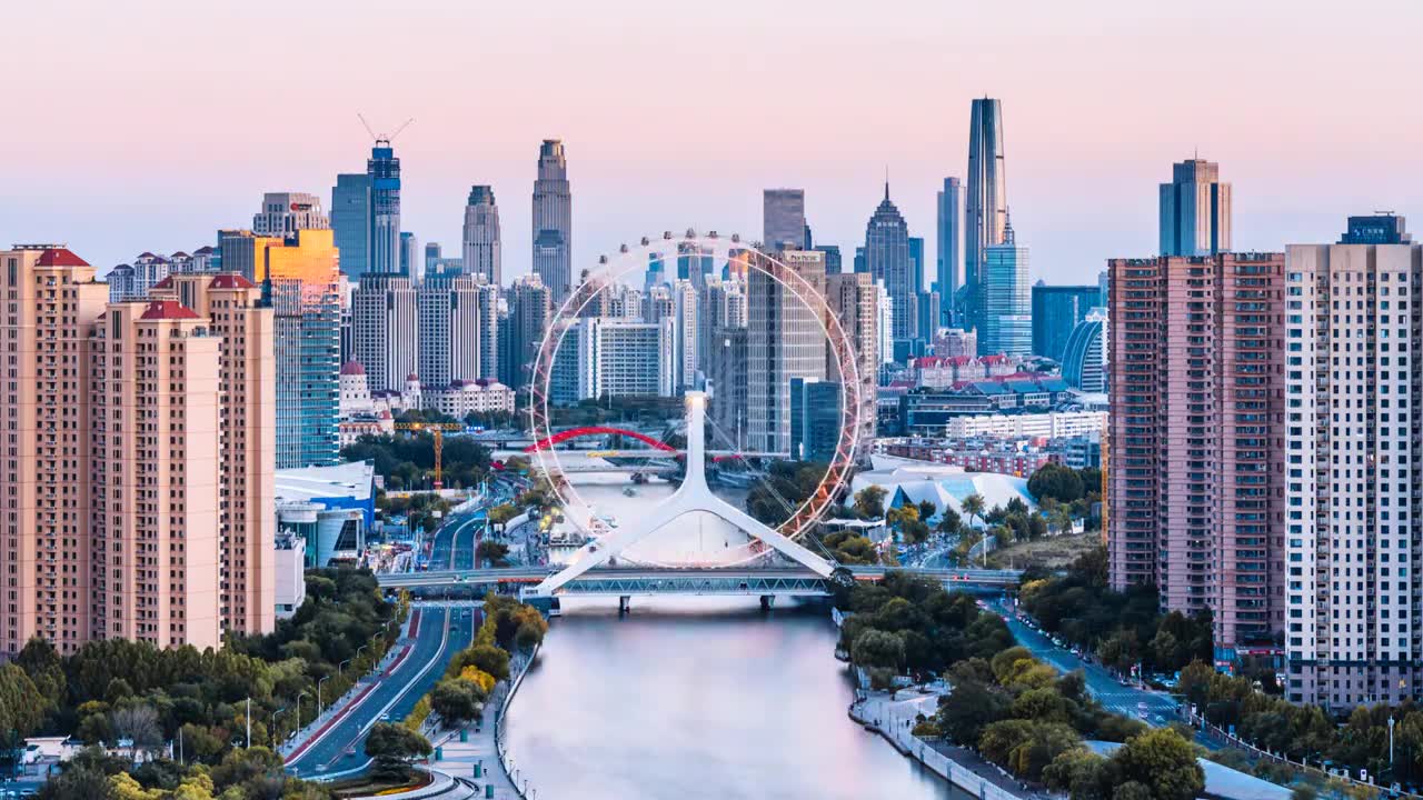 中国天津海河天津之眼摩天轮城市天际线高视角日转夜延时摄影视频素材画面1
