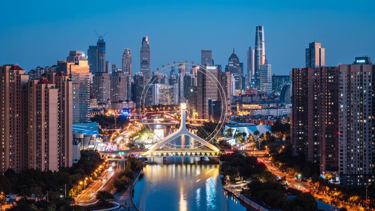 中国天津海河天津之眼摩天轮城市天际线高视角日转夜延时摄影视频素材画面4