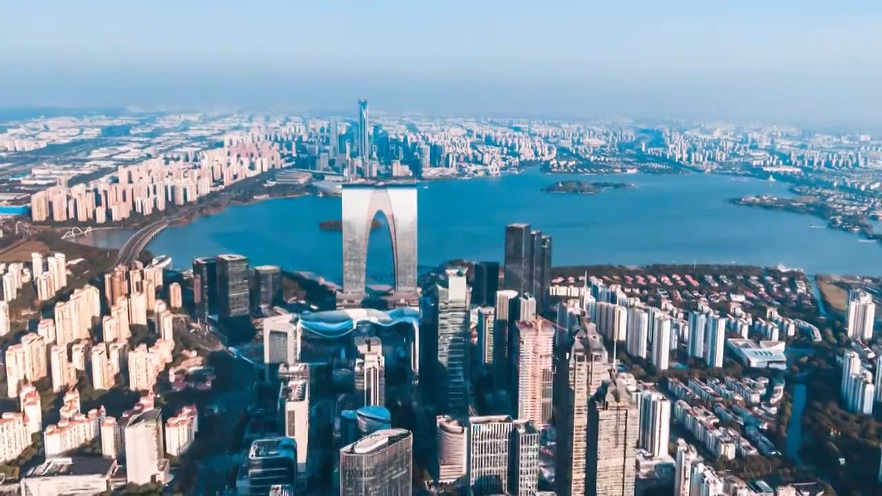 中国江苏苏州东方之门金鸡湖城市街道天际线风光航拍延时摄影视频素材画面1