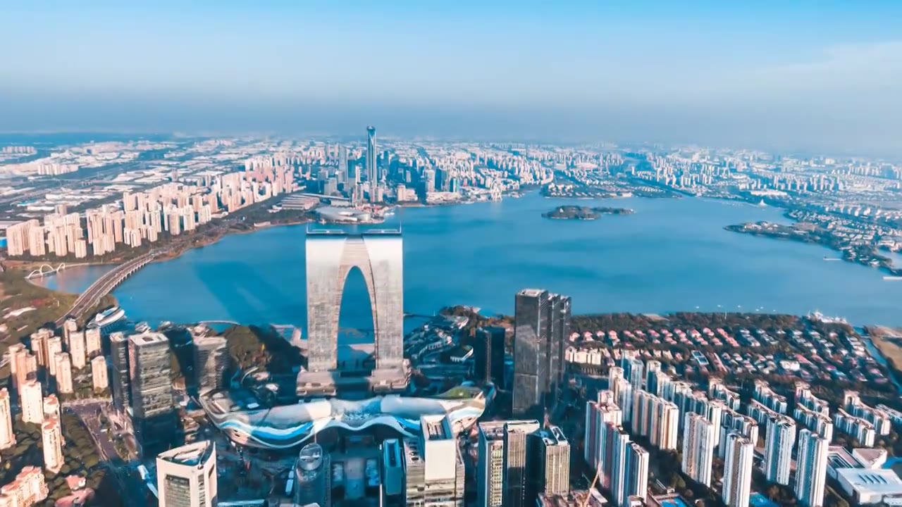 中国江苏苏州东方之门金鸡湖城市街道天际线风光航拍延时摄影视频素材画面4
