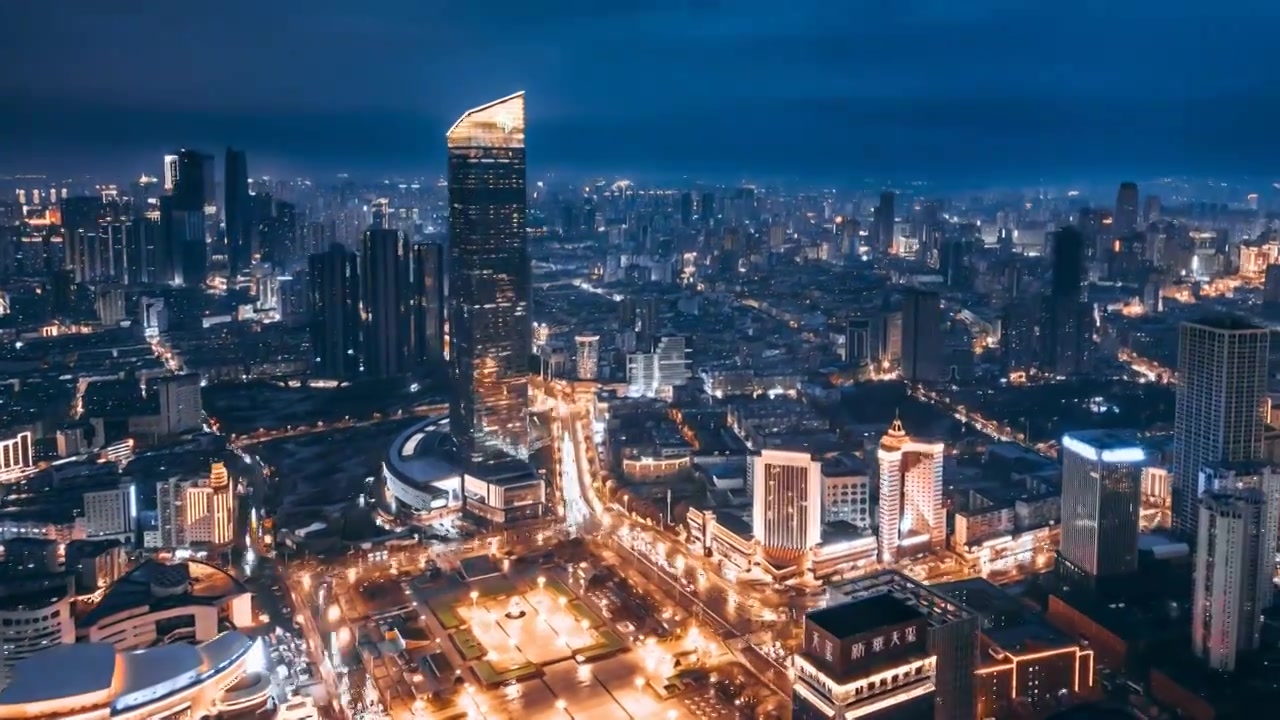 中国辽宁沈阳市府恒隆和人民广场城市天际线夜景航拍环绕延时摄影视频素材画面3