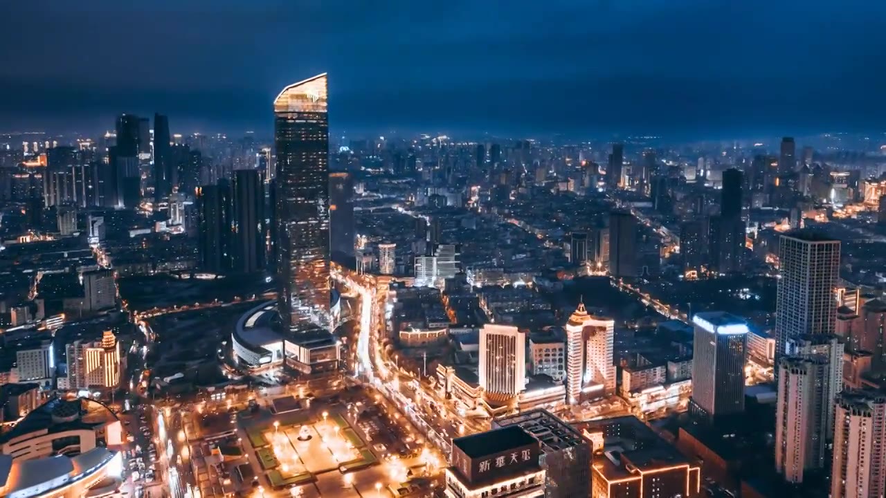 中国辽宁沈阳市府恒隆和人民广场城市天际线夜景航拍环绕延时摄影视频素材画面4