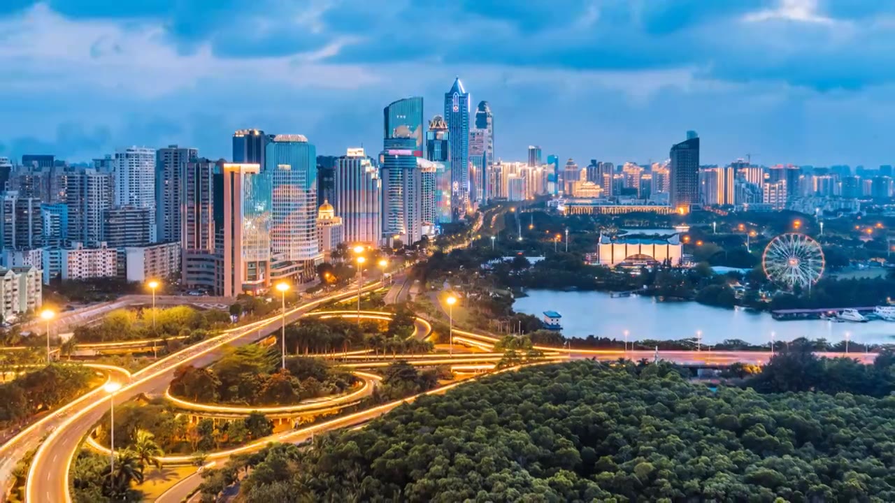 中国海南海口滨海立交桥城市高楼天际线高视角日转夜延时摄影视频素材画面4