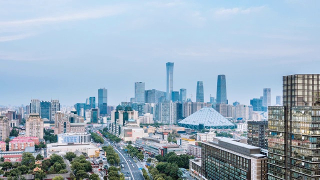 中国北京CBD建筑群和城市车流日转夜延时摄影视频素材