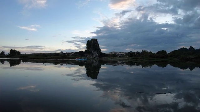 风云变幻下漓江边的伏波山视频素材