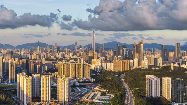 T/L MS HA ZI Shenzhen skyline with moving clouds/深圳，中国视频素材