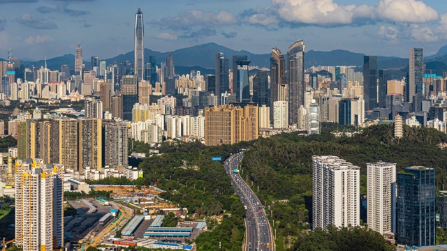 T/L MS HA TU Shenzhen skyline with moving clouds/深圳，中国视频素材