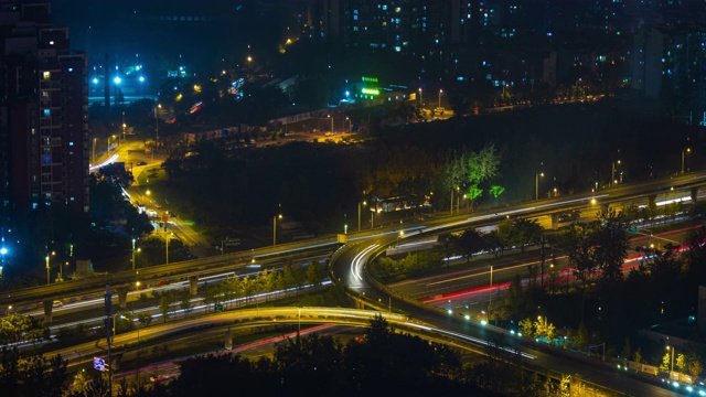 夜景时间照亮成都城市交通街道道路屋顶延时全景4k中国视频素材