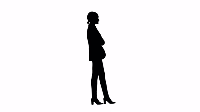 剪影自信的年轻女商人双臂交叉摆姿势视频素材画面1
