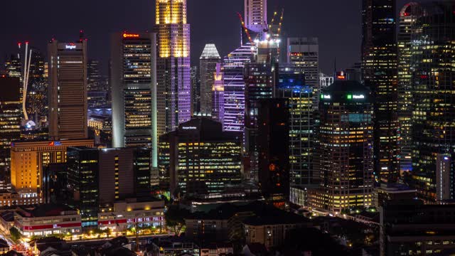 夜间照明新加坡城市市中心屋顶延时全景4k视频素材