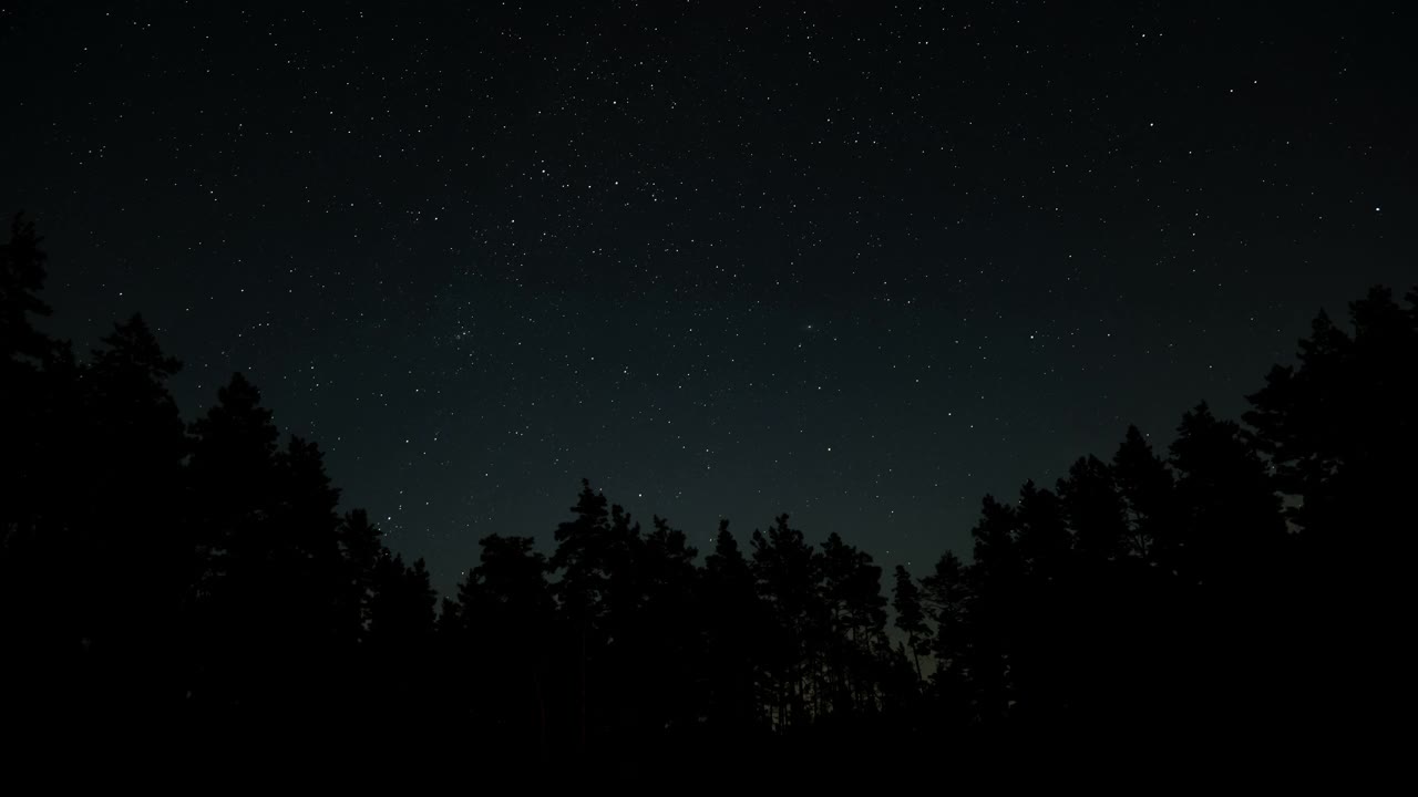 夜空中移动的星星的时间间隔视频素材