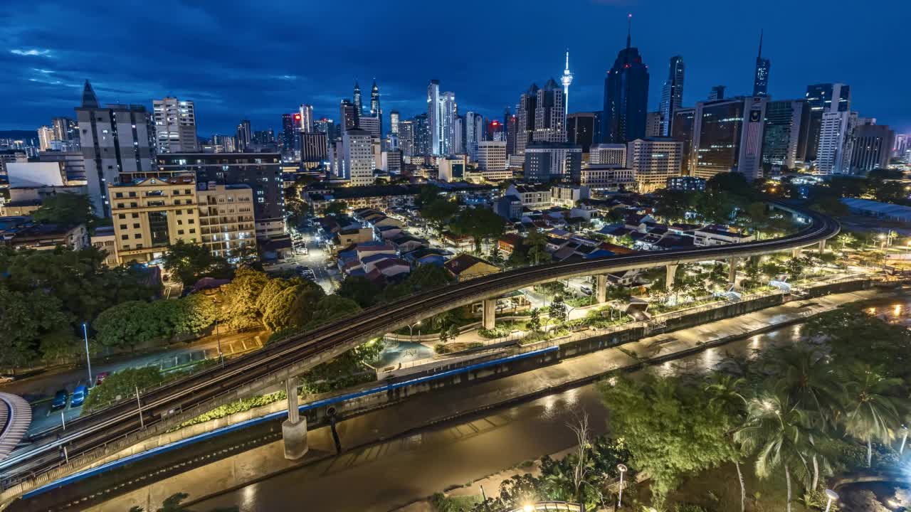 吉隆坡在季风季节的城市景观的时间间隔4k超高清镜头视频素材