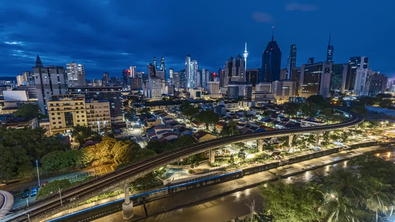 吉隆坡在季风季节的城市景观的时间间隔4k超高清镜头视频素材