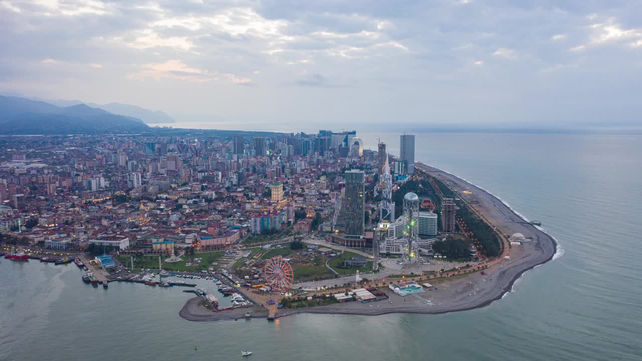 Panoramic hyperlapse of Batumi city at dramatic sunset – drone shot视频素材