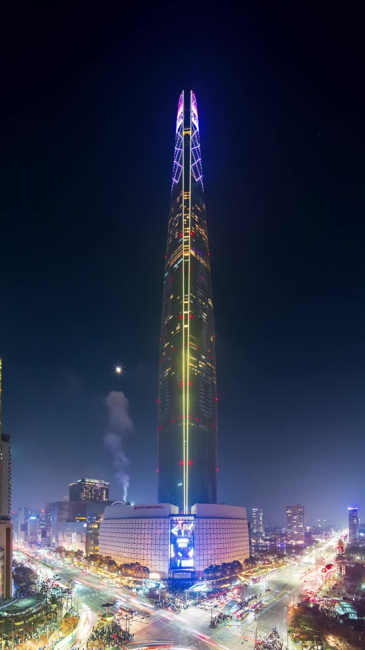 首尔松坡区，乐天世界大厦，市中心和冬季夜晚的雪景视频素材