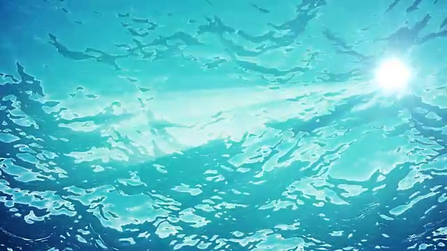 高质量的海浪动画从水下漂浮的浮游生物。光线照进来。伟大的流行海洋背景高清，高清晰度4k。视频素材画面4