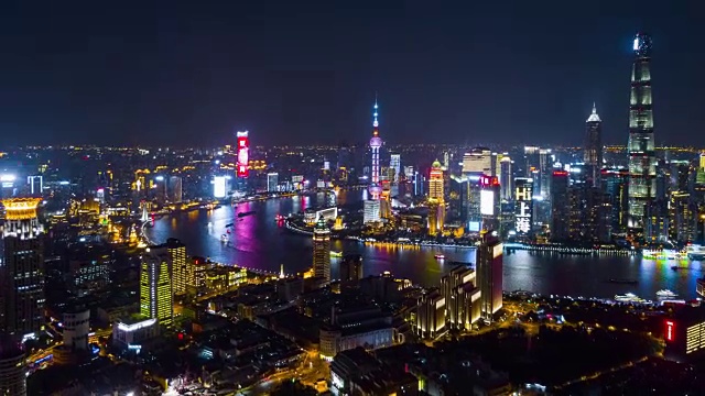 中国夜景时间照亮著名的上海浦东市景航拍全景，4k时间流逝视频素材