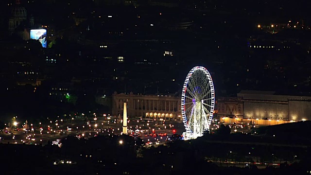 空中夜景的交通时间在巴黎，著名的摩天轮的协和广场，法国视频素材