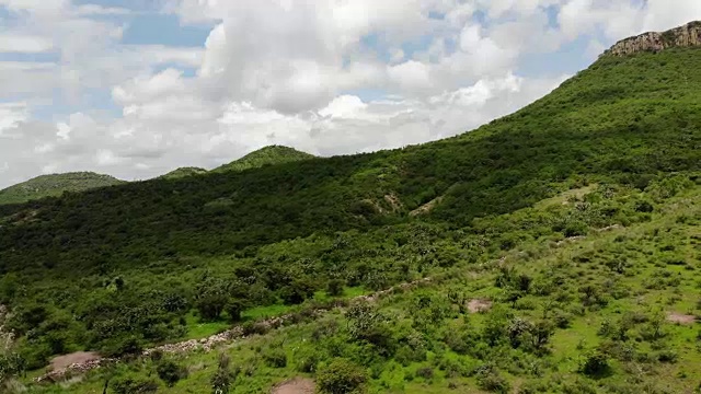 航拍山地绿化景观和高速公路视频素材